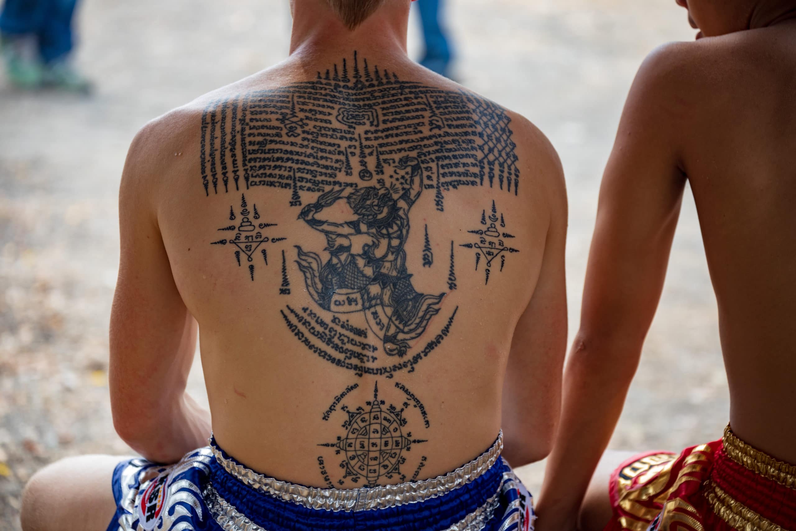 muay thai fighter with tattoo