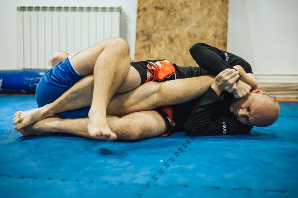 two man practing Brazilian Jiu-Jitsu 