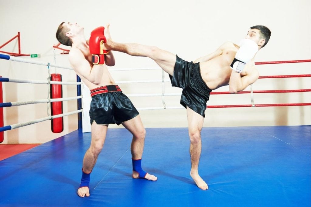 muay thai high kick hitting opponent
