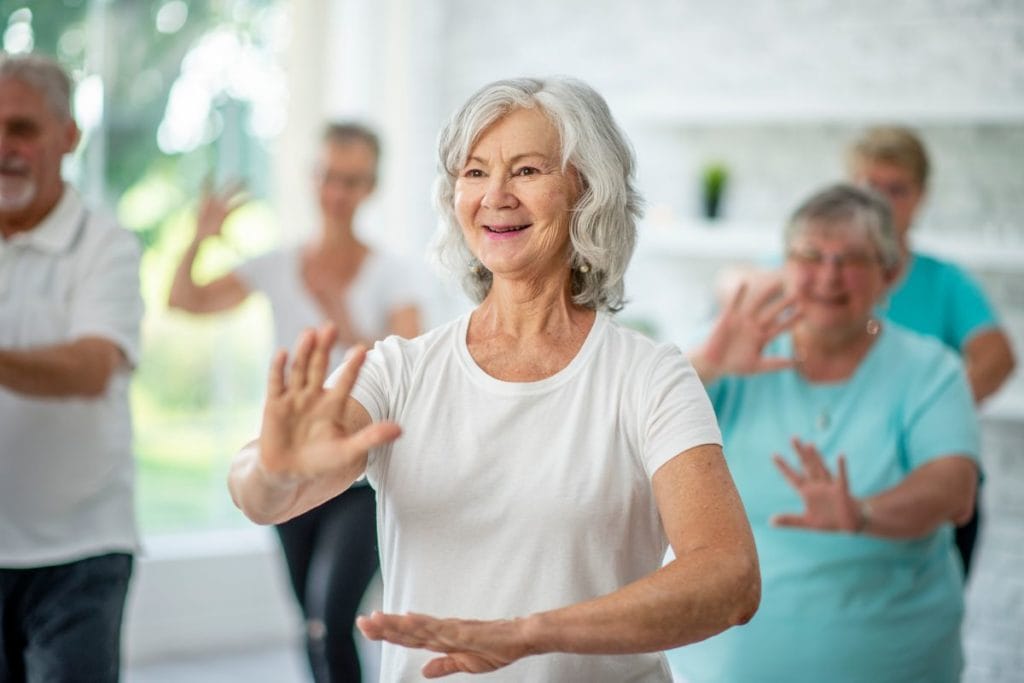 A group of seniors studying Tai Chi